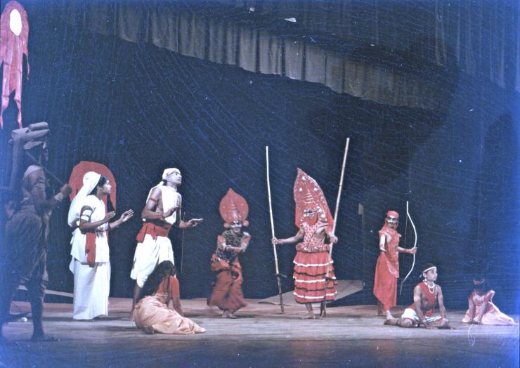 a group of performers onstage in costume