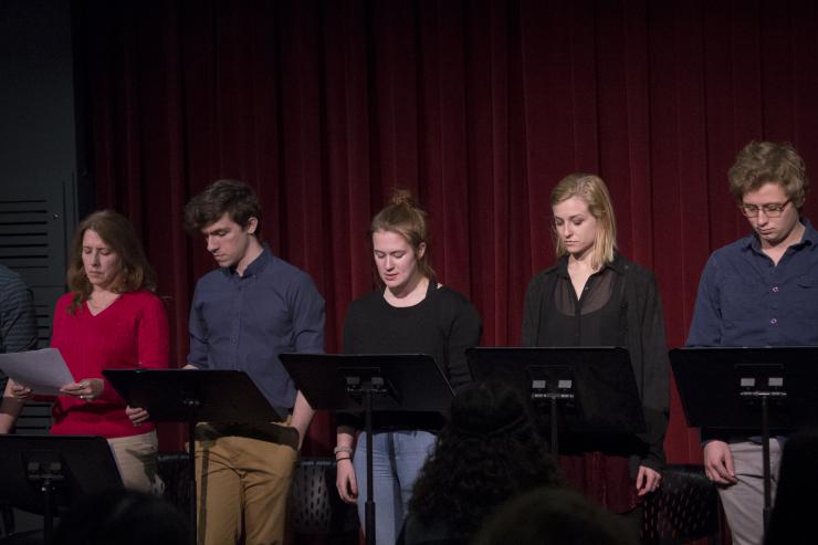 a group of actors at a staged reading