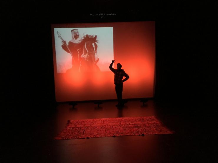 an actor's silhouette on stage