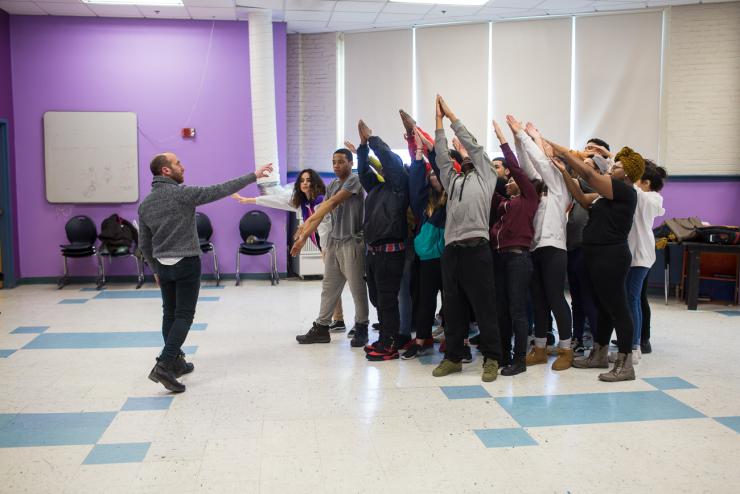Yo-El Cassell guides students in a movement exercise