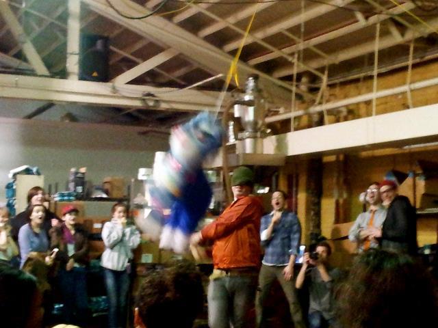 a man hitting a piñata 