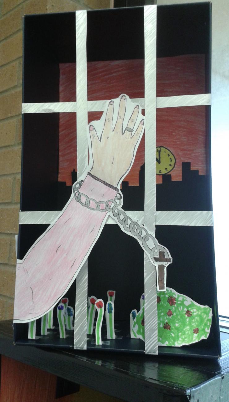 drawing of a chained hand over bars