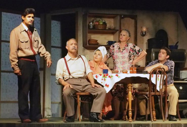 a family scene on stage