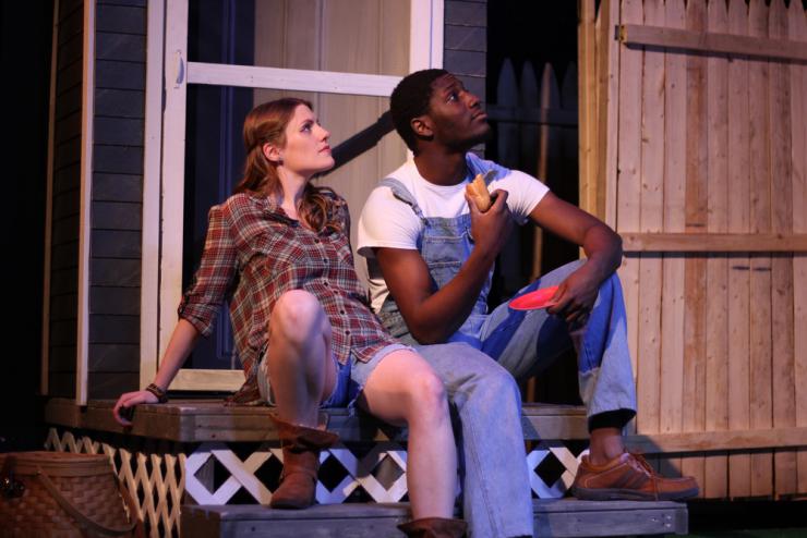 Two actors on a porch set