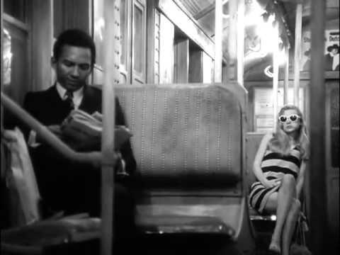 Black man and white woman on a train