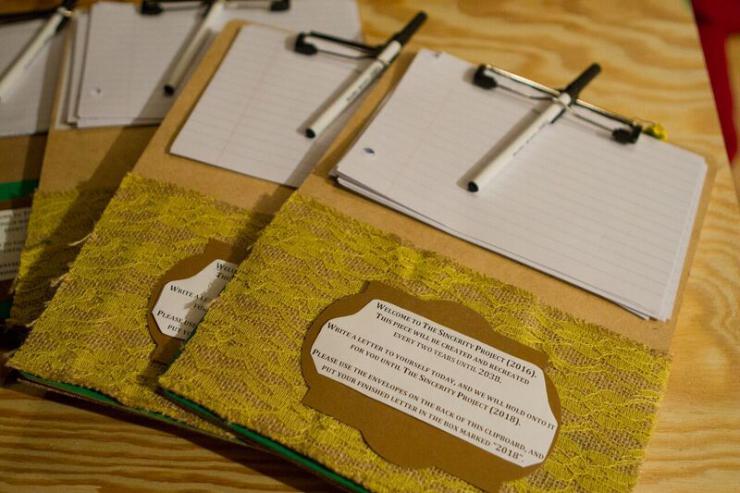 clip boards with paper on them 