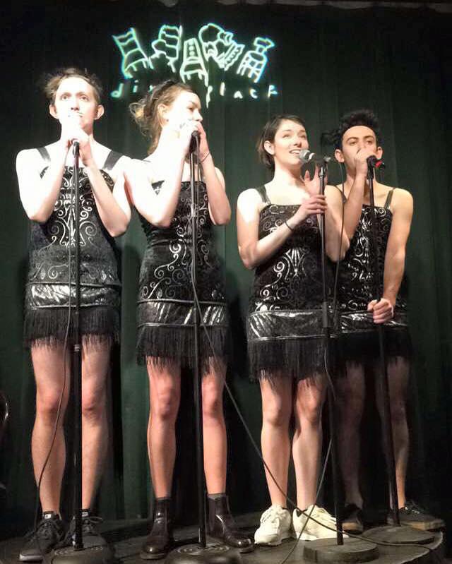 4 performers singing