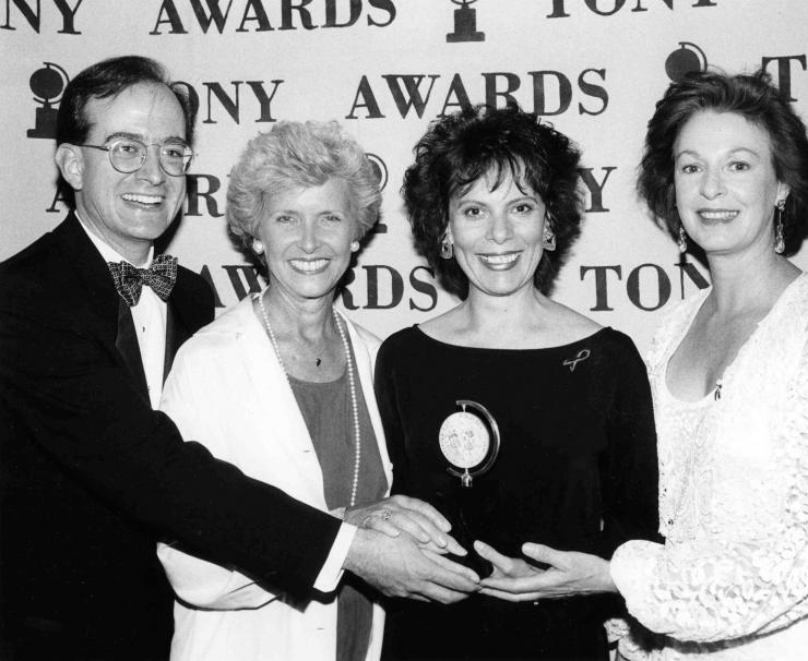 Emily Mann and friends pose with her Tony Award