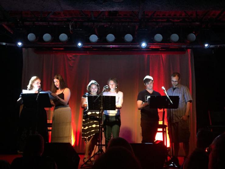 six actors perform in a staged reading