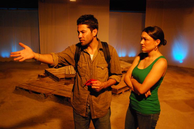 an actor and an actress performing a scene