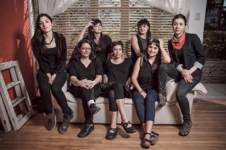Chilean Theatremakers sitting together on a couch