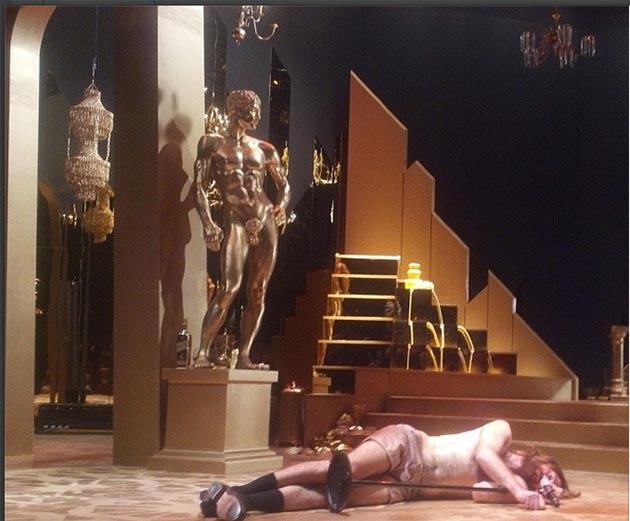 an actor on the floor of the stage 