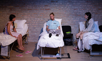 actors onstage in hospital beds