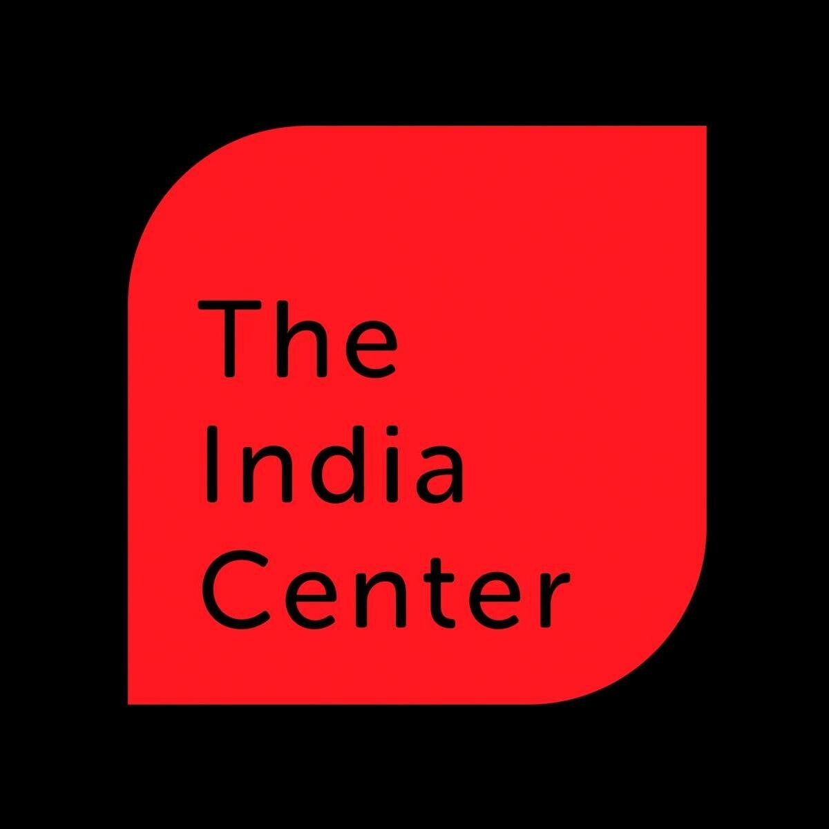 red shape with black text india center