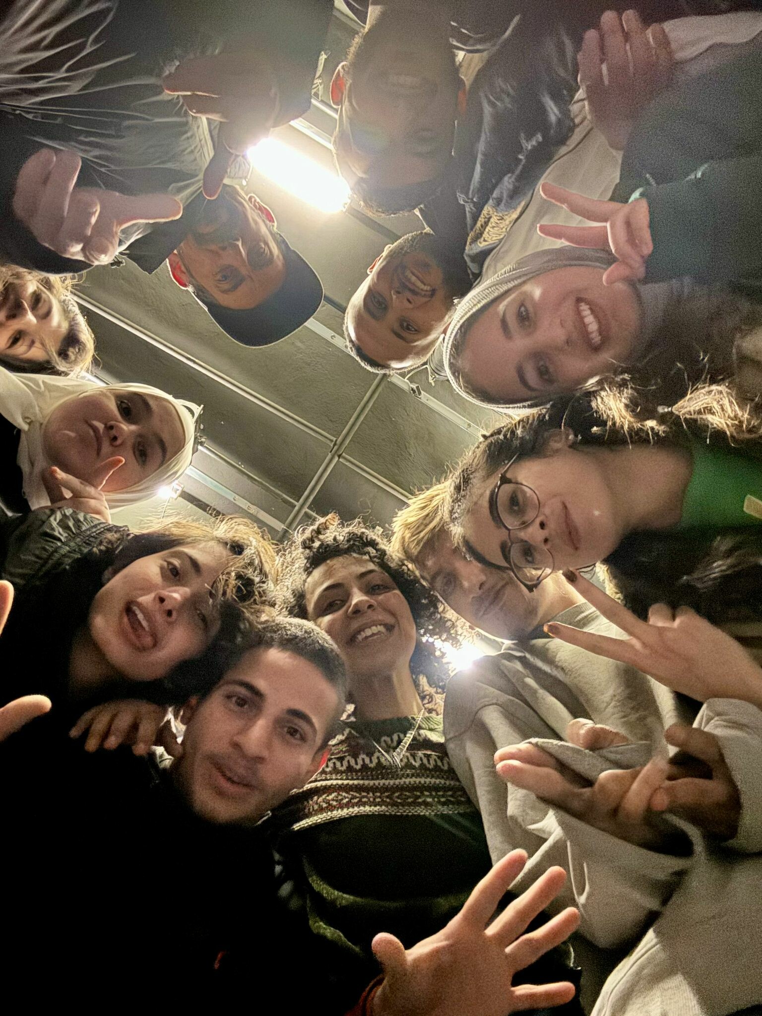 A selfie of a group of students smiling.