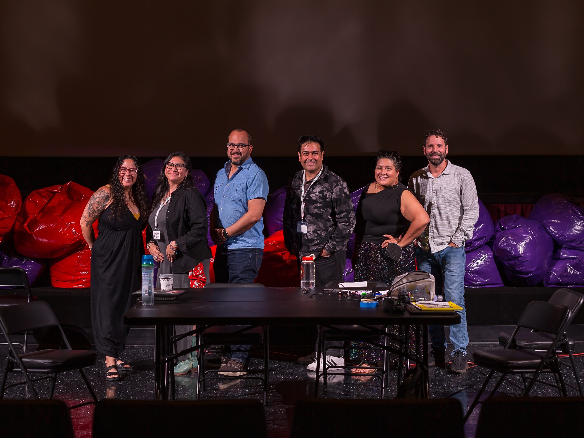 The Author and their collaborators stand on stage during the Lantinx Theatre Commons Designer and Director Colaboratorio.