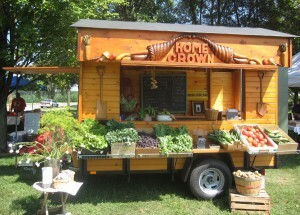 A farmstand labelled "Home Grown".